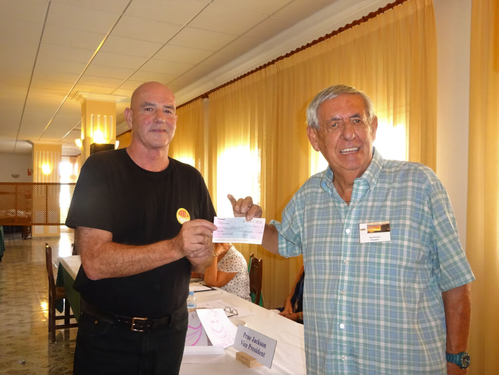 Moraira-Teulada U3A presents cheque to the ‘Make a Smile’ Children’s charity.